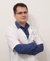 Dr. Adrian Grivei